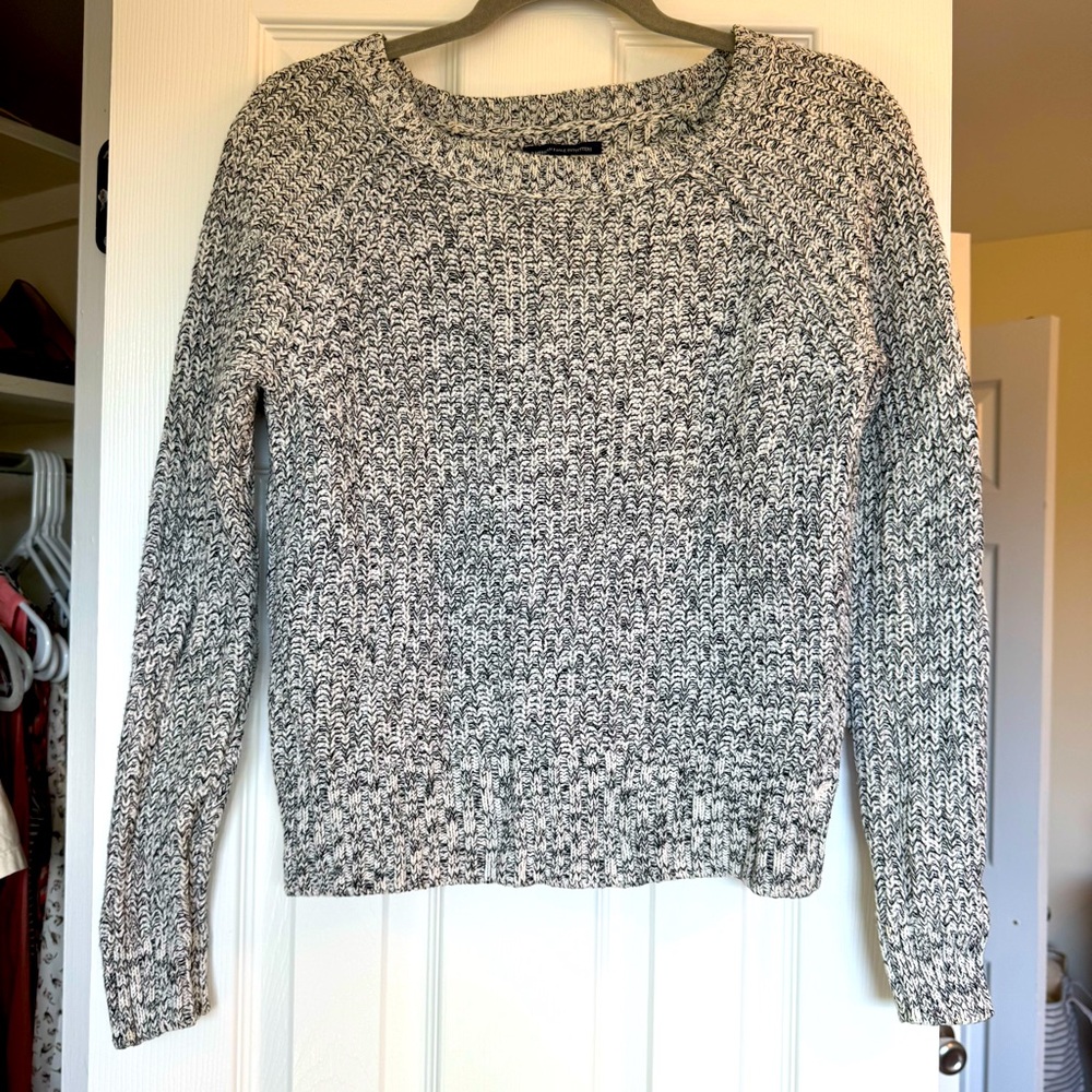 Cozy American Eagle Outfitters holiday sweater perfect with jeans and boots!